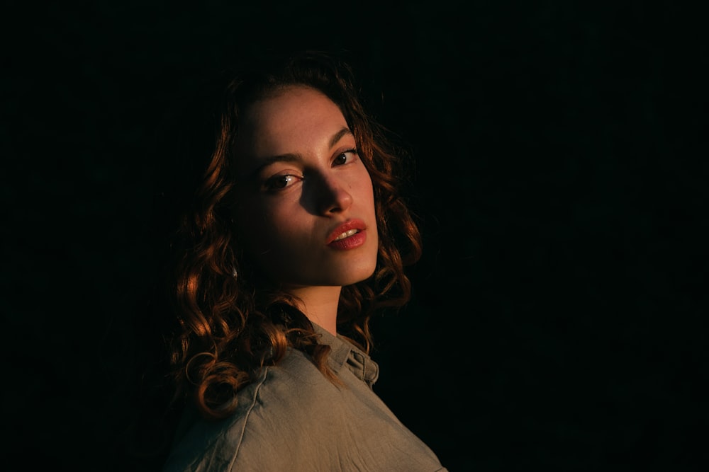 woman in gray collared shirt