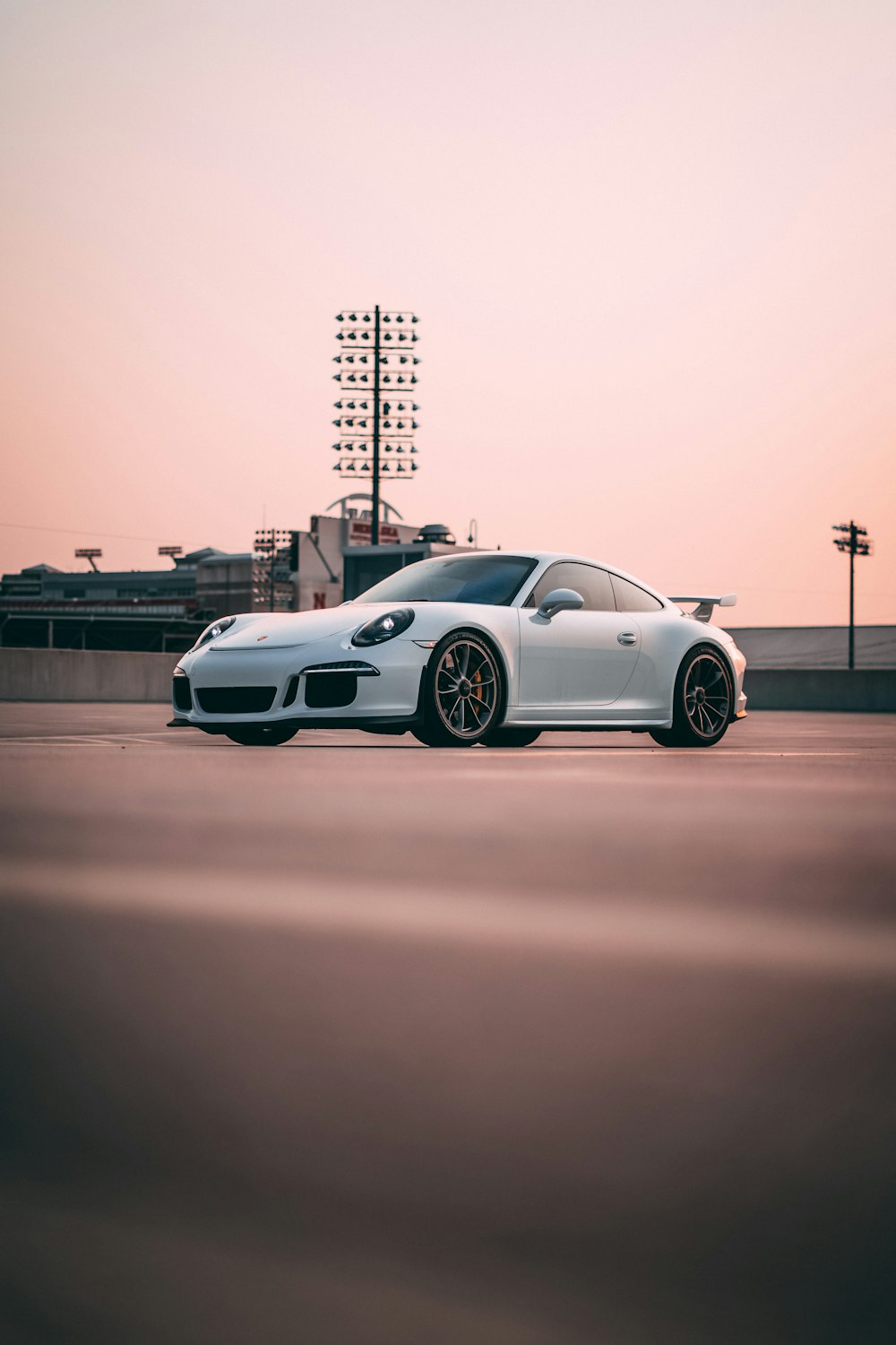 white porsche 911 on road during daytime