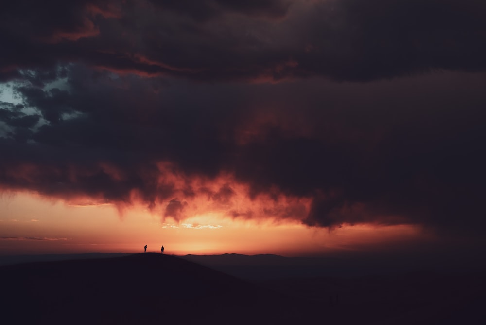 silhouette of mountain during sunset