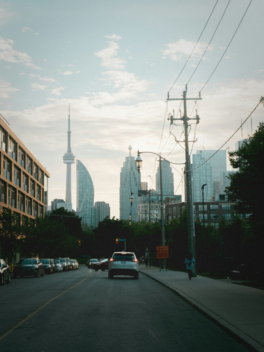 cars on road near buildings during daytime