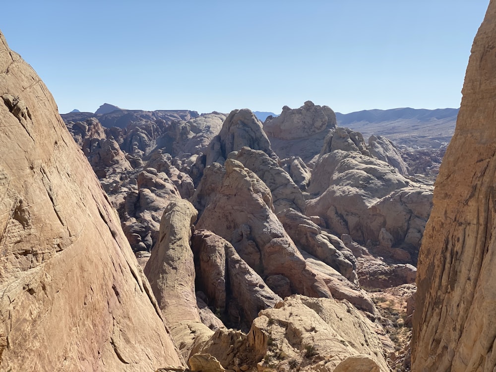 brown rocky mountain under blue sky during daytime