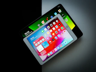 Multiple tablets showing different apps and features.
