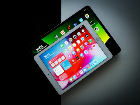 Multiple tablets showing different apps and features.