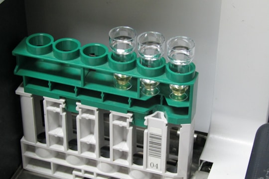 Rows of labeled vials stored in a temperature-controlled freezer.