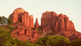 brown rock formation under white sky during daytime
