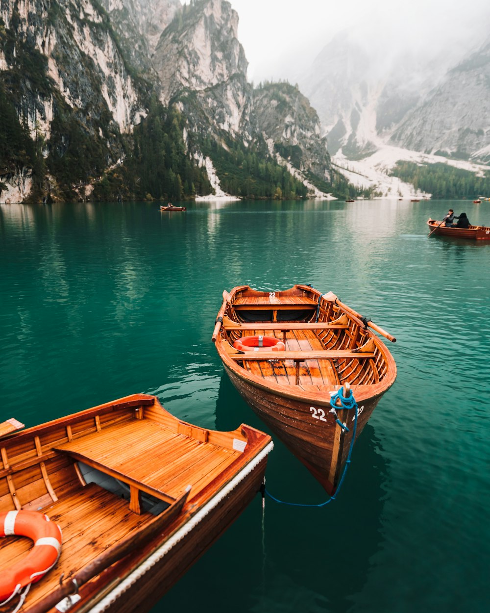 brown wooden boat on water