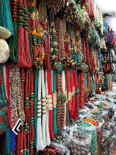 A vibrant display of unique African fabrics and jewelry.