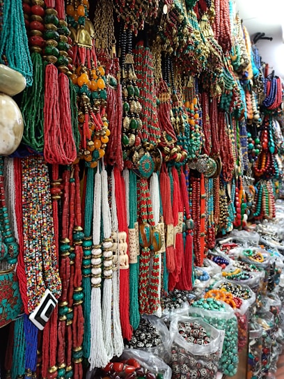 An overview of diverse African products showcasing fabrics and jewelry.
