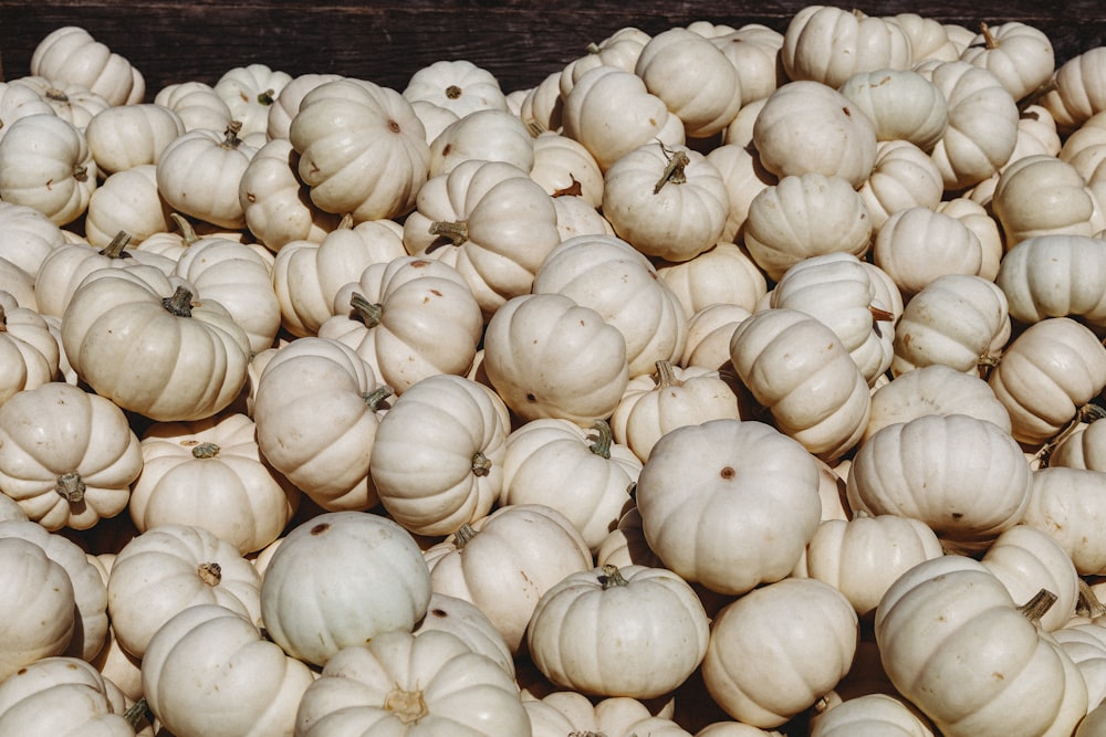 white garlic on brown wooden crate