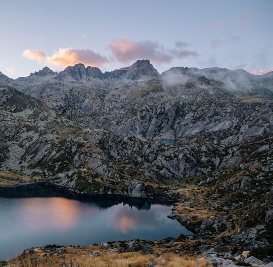 gray and white mountain near body of water during daytime in Lac de la Glère France