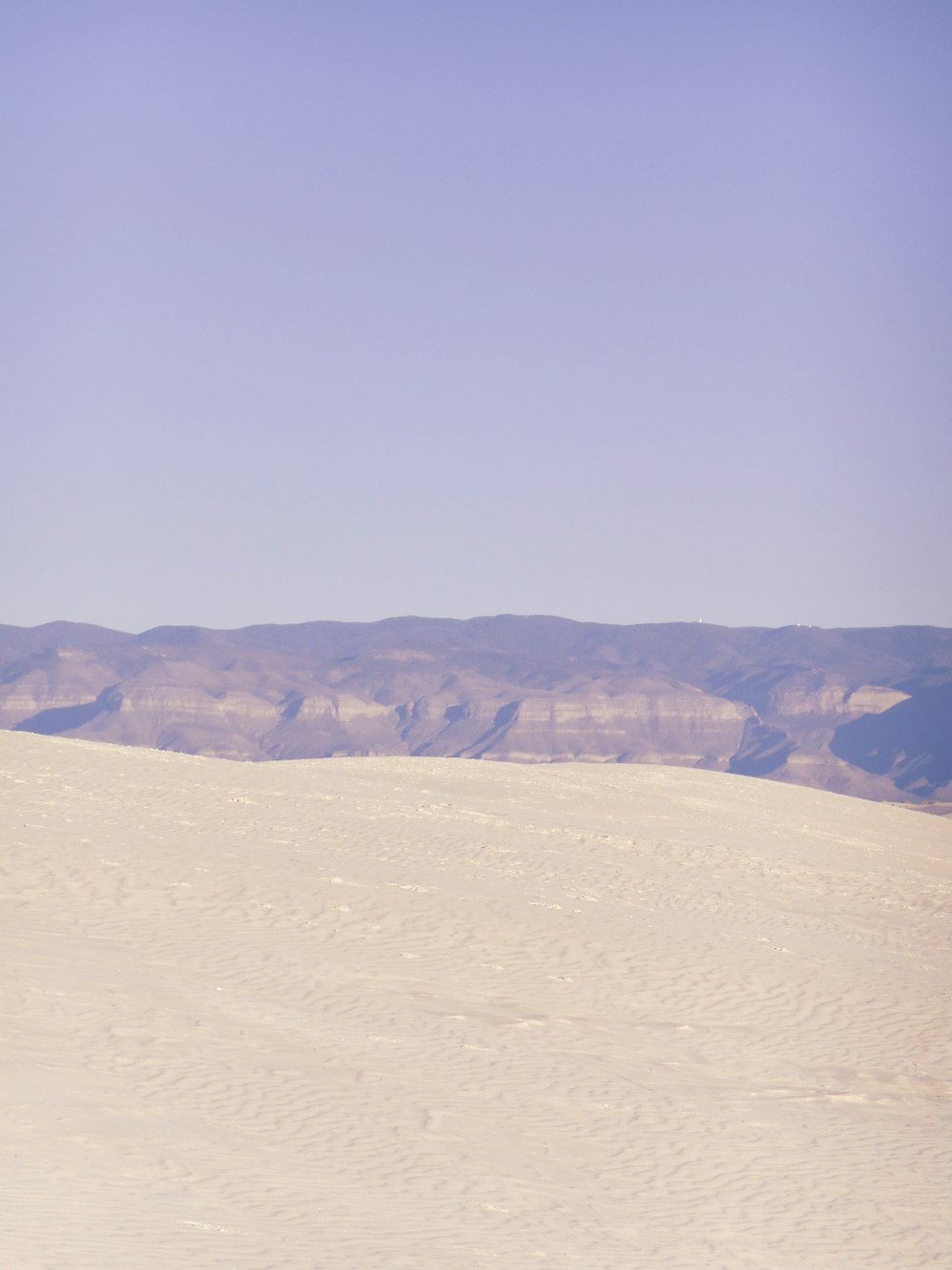 brown mountain under blue sky during daytime