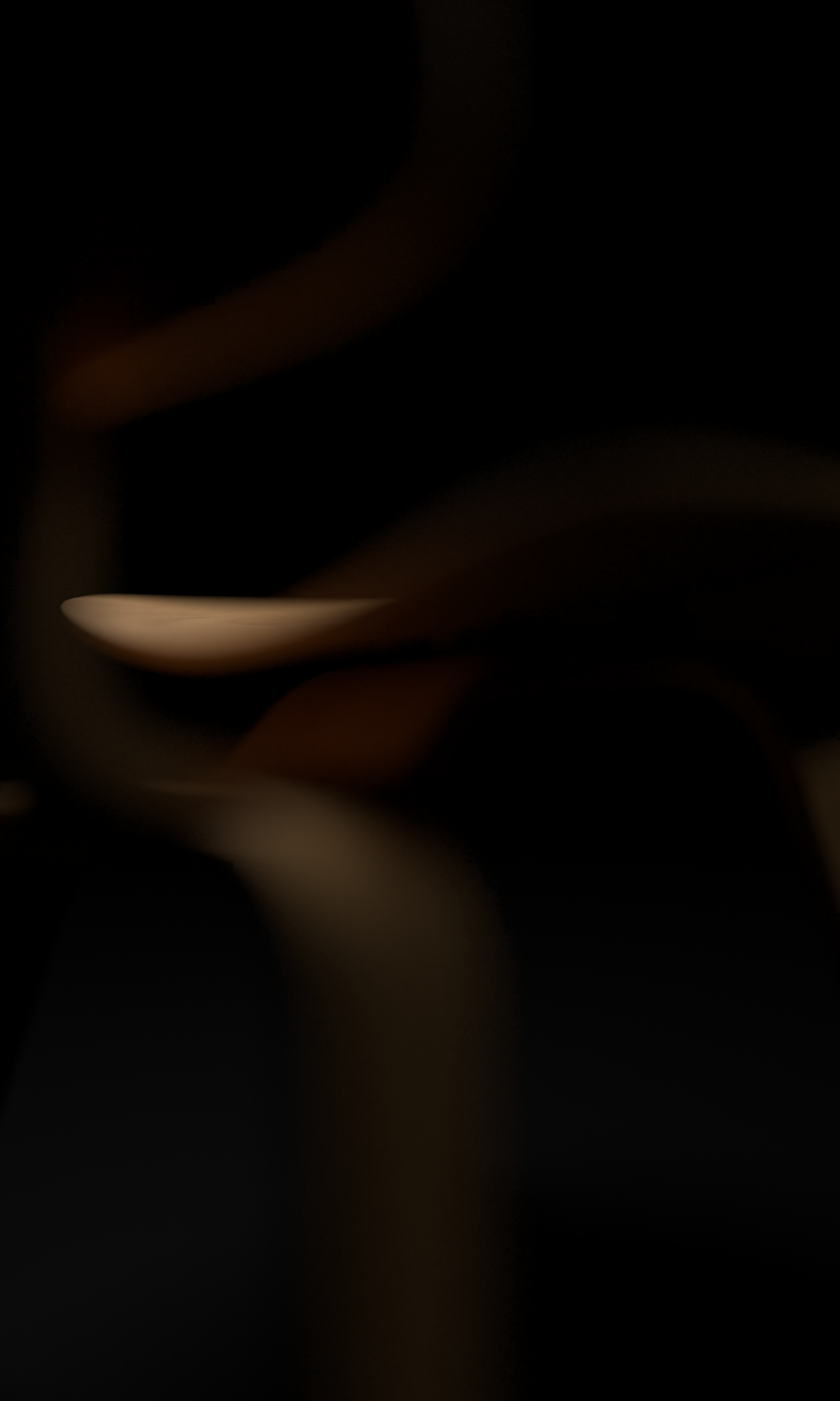 An outdoor wicker dining chair.