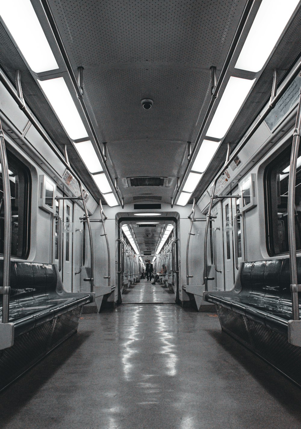 white and black train in train station