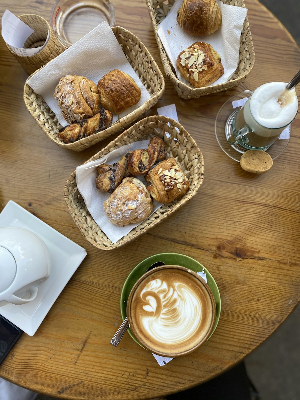 brown cookies on white ceramic plate beside white ceramic mug