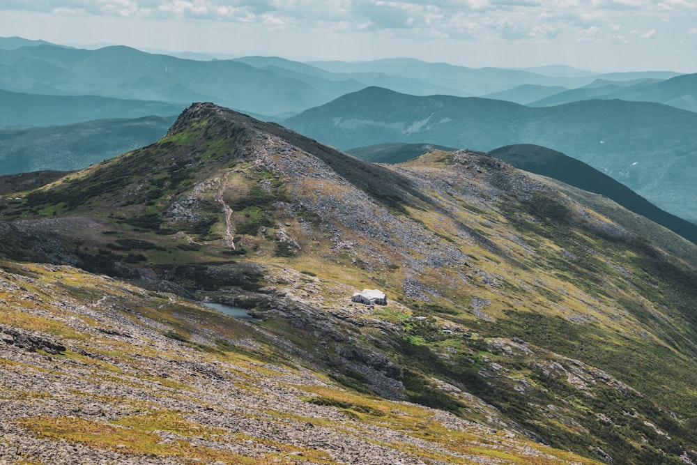 green and brown mountain under blue sky during daytime