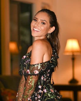 woman in black and white floral off shoulder dress