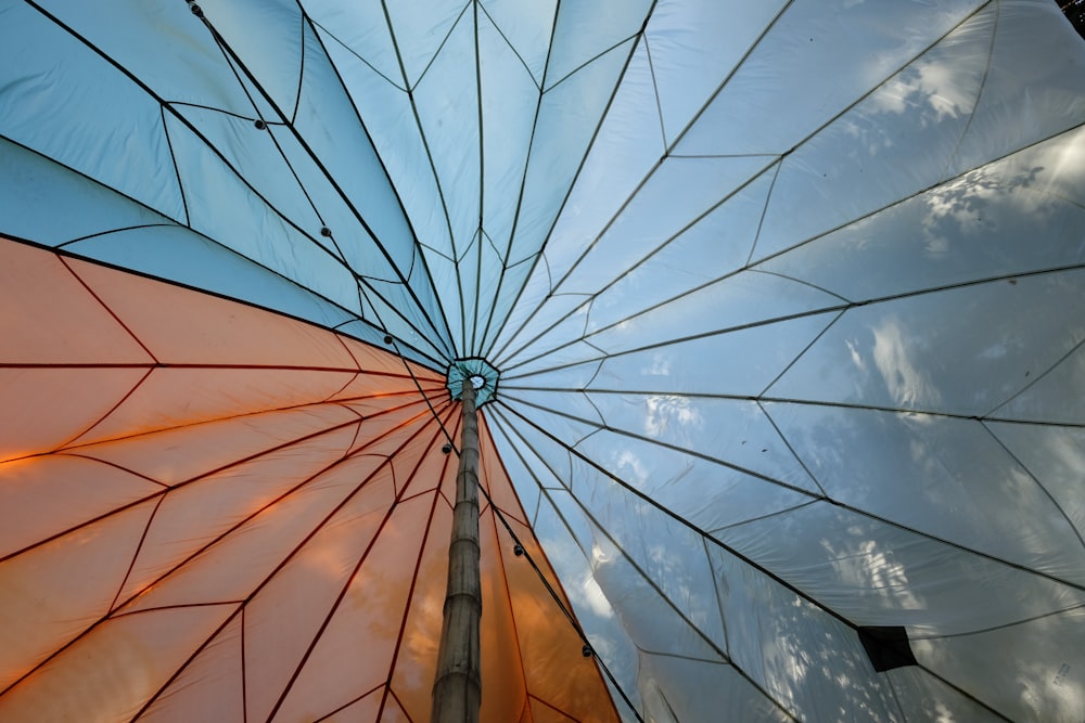 white and brown umbrella under blue sky during daytime