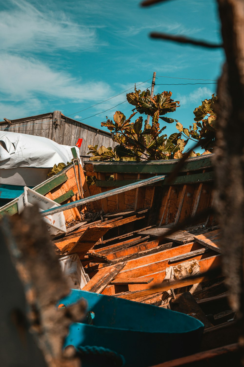 brown wooden boat on body of water during daytime