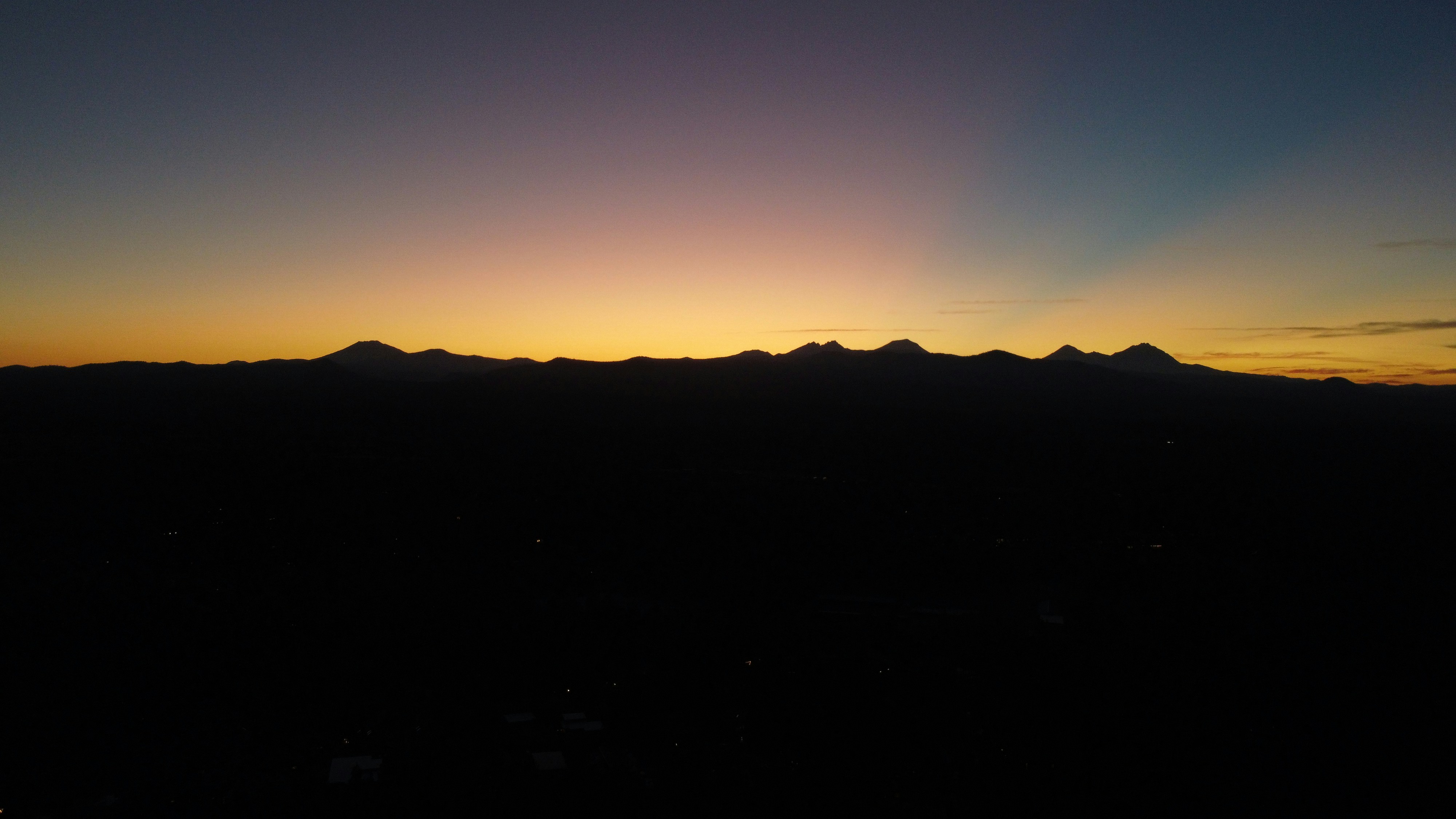 silhouette of mountain during sunset
