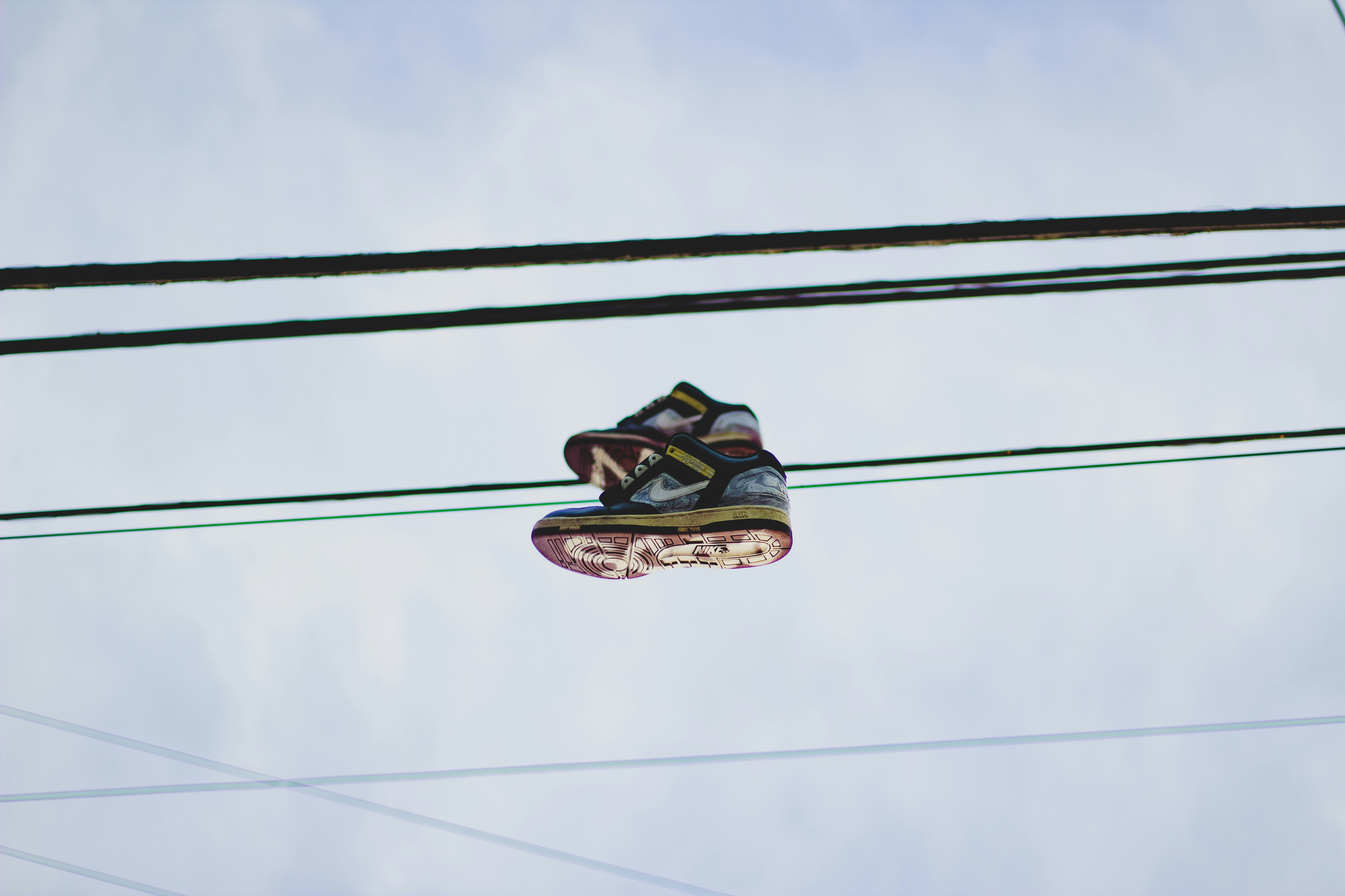 shoes on electric line