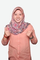 woman in pink button up shirt wearing purple and white hijab