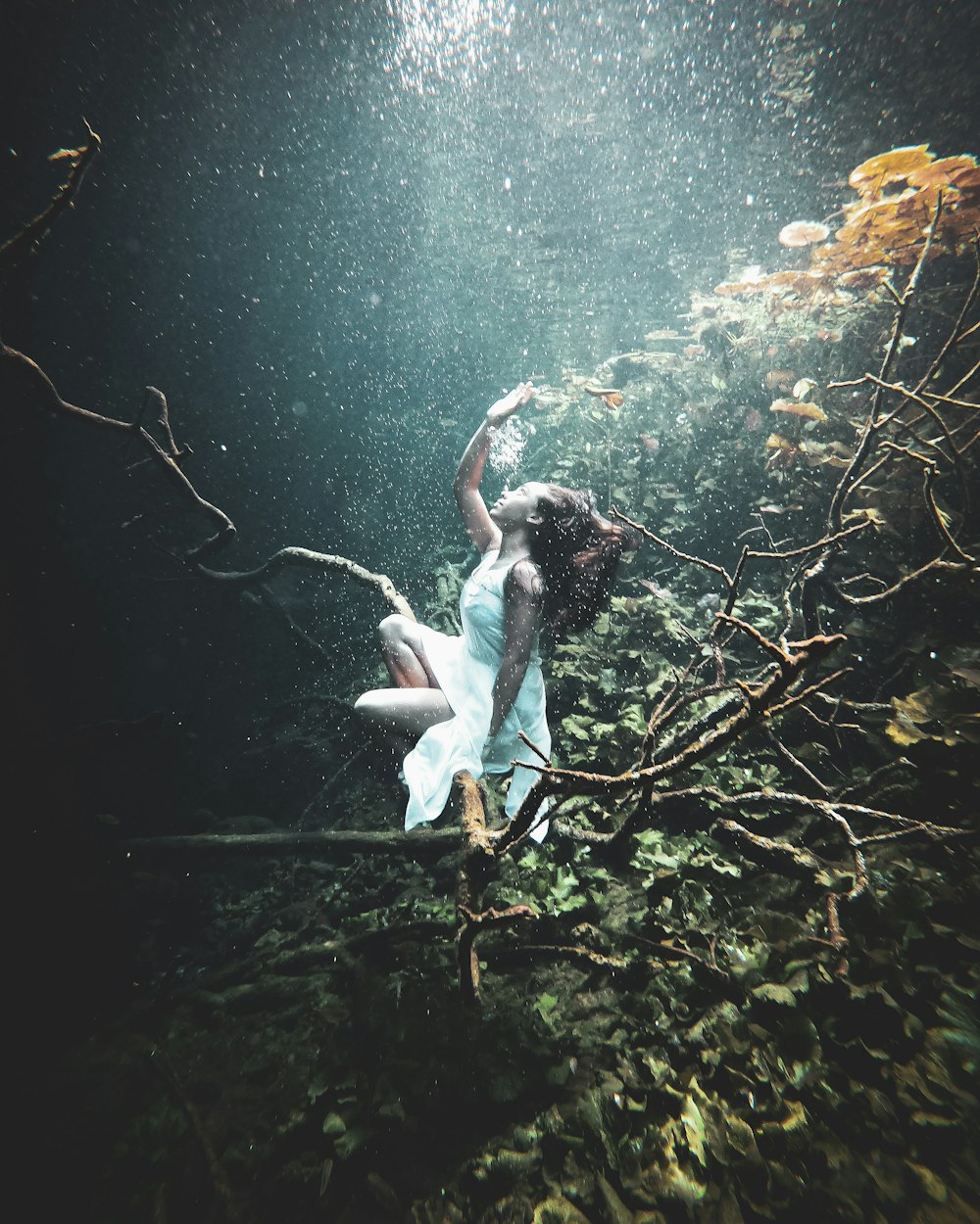 woman in white dress in water