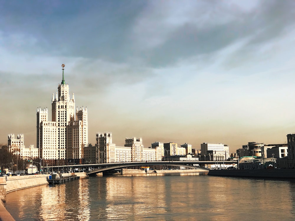 city skyline across body of water during daytime