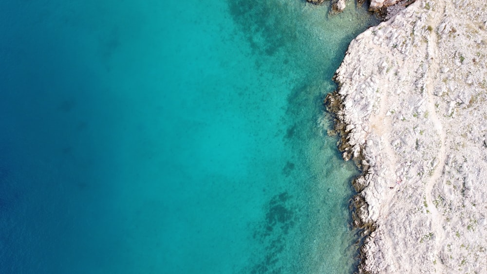 aerial view of rocky shore during daytime