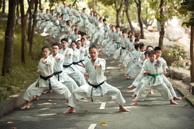 Students lined up and bowing at the start of a martial arts class