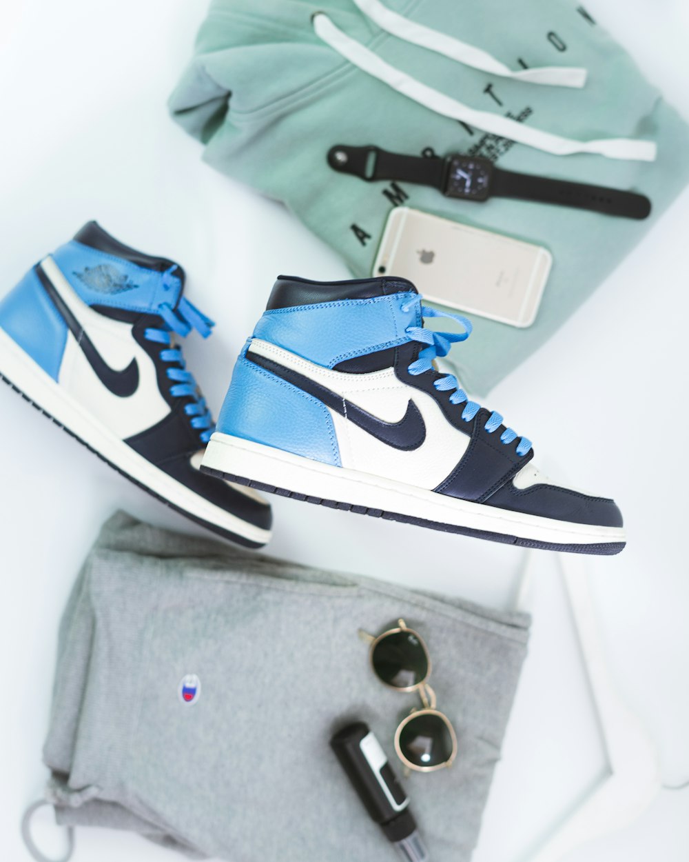 blue and white nike air jordan 1 shoes