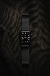 black and silver analog watch
