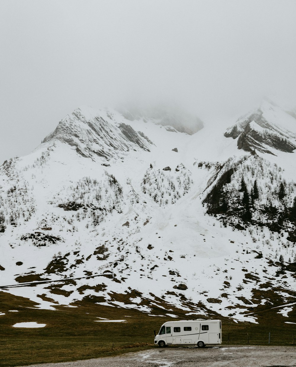 snow covered mountain during daytime