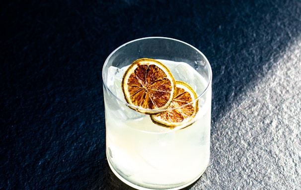 clear drinking glass with white liquid