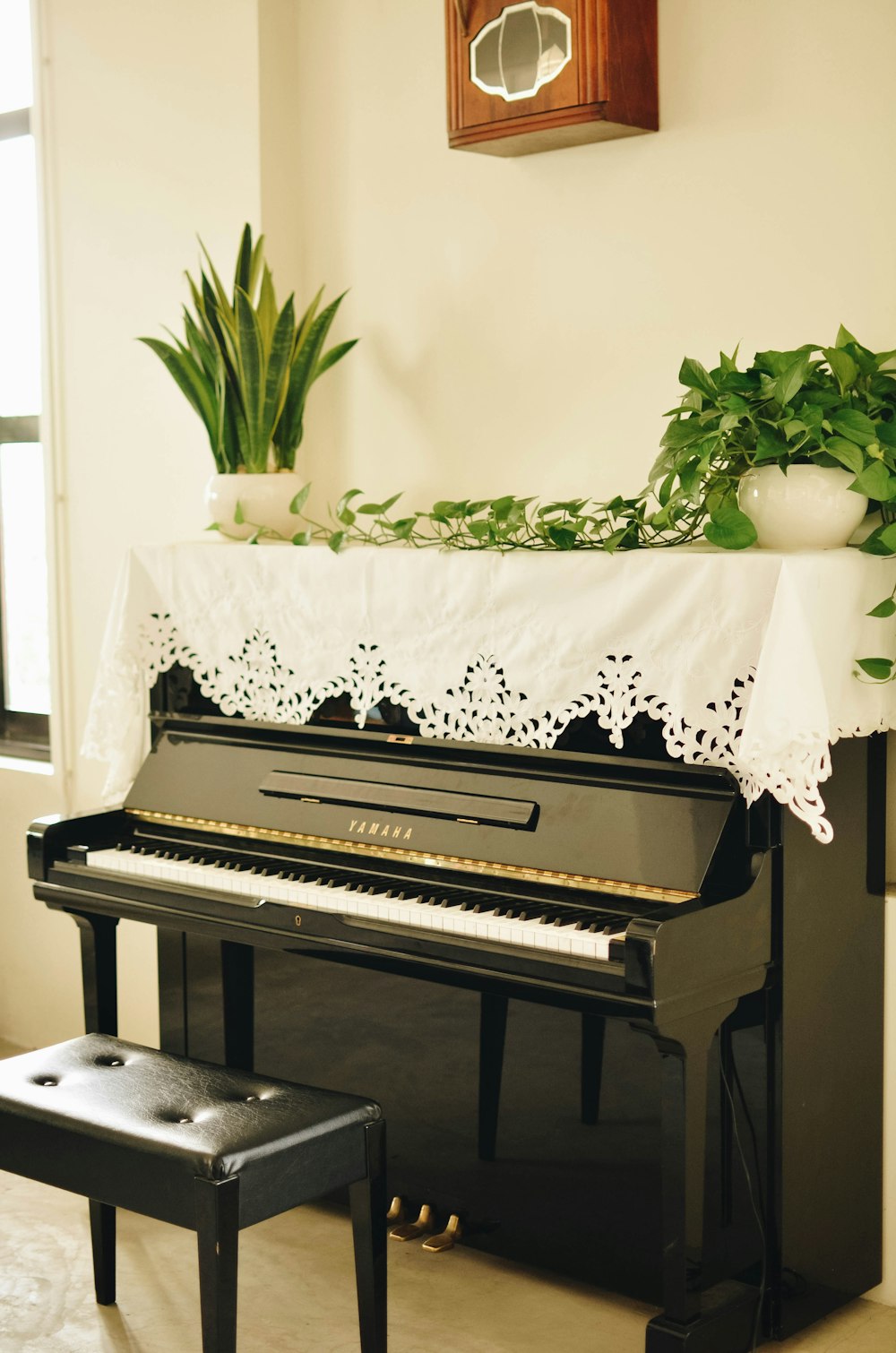 white and black upright piano