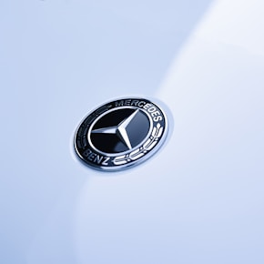 black and silver round logo