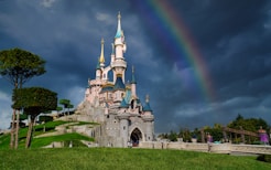 white and gray concrete castle under blue sky