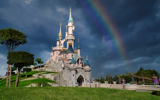 white and gray concrete castle under blue sky