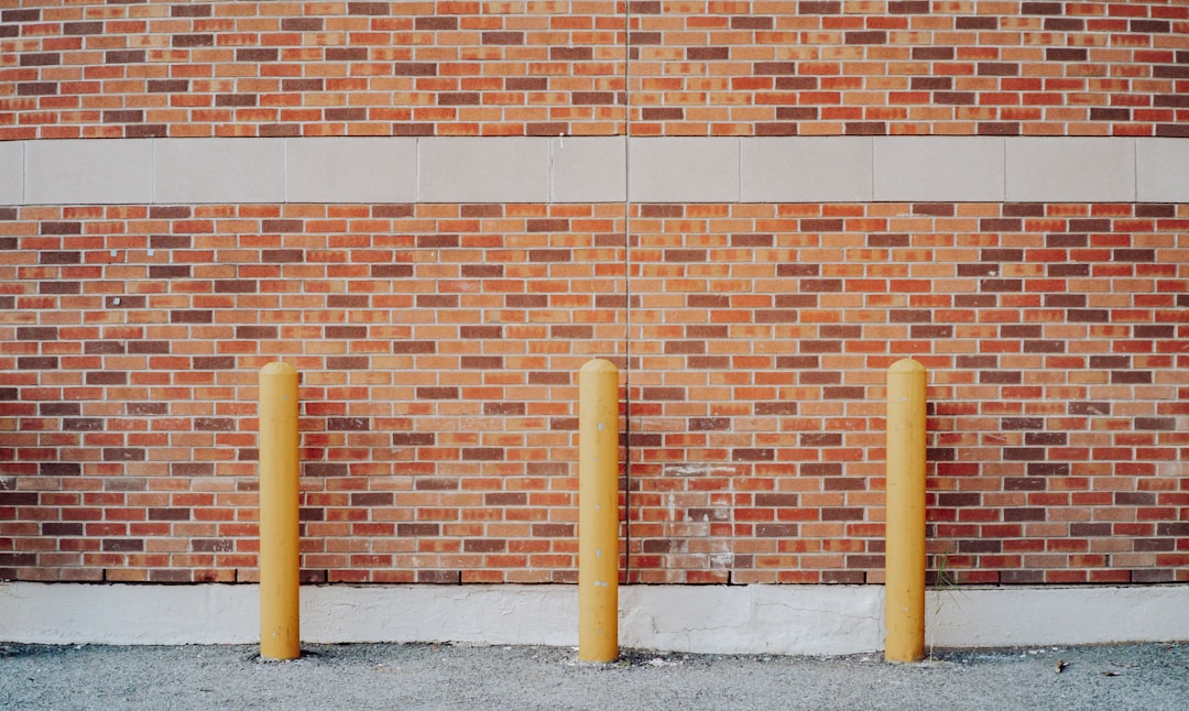 brown brick wall during daytime