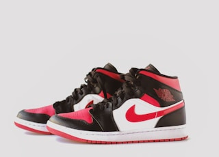 black white and red nike air jordan 1 s