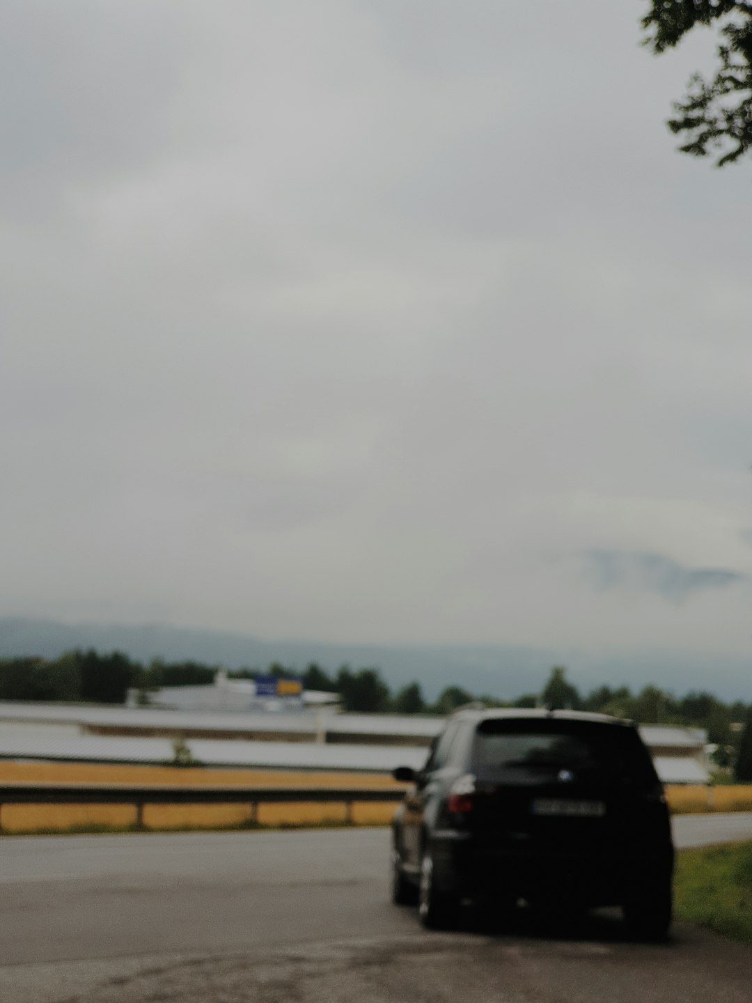 black suv on road during daytime