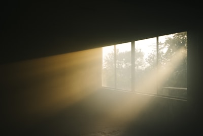 Clean and organized air ducts with sunlight streaming through a window.