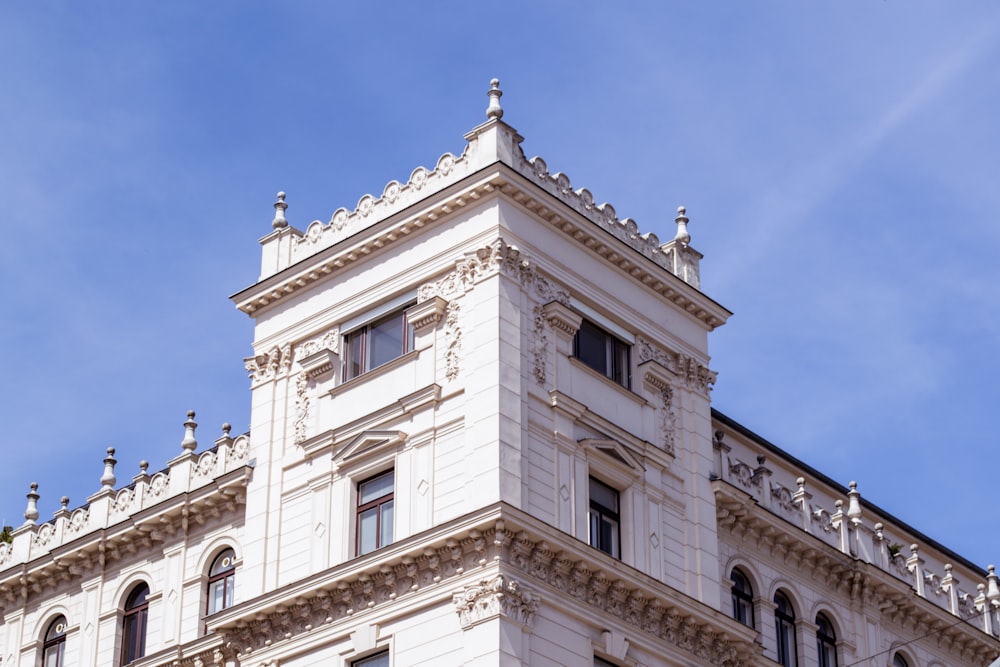 white concrete building under blue sky during daytime