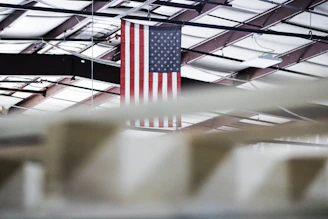 A warm, inviting workspace featuring Noble Crest products with a subtle American flag in the background.
