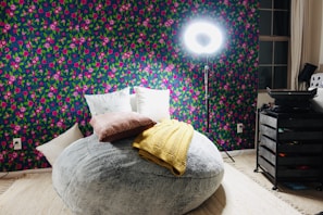 A simple setup guide showing how to fluff and arrange a bean bag chair for perfect comfort