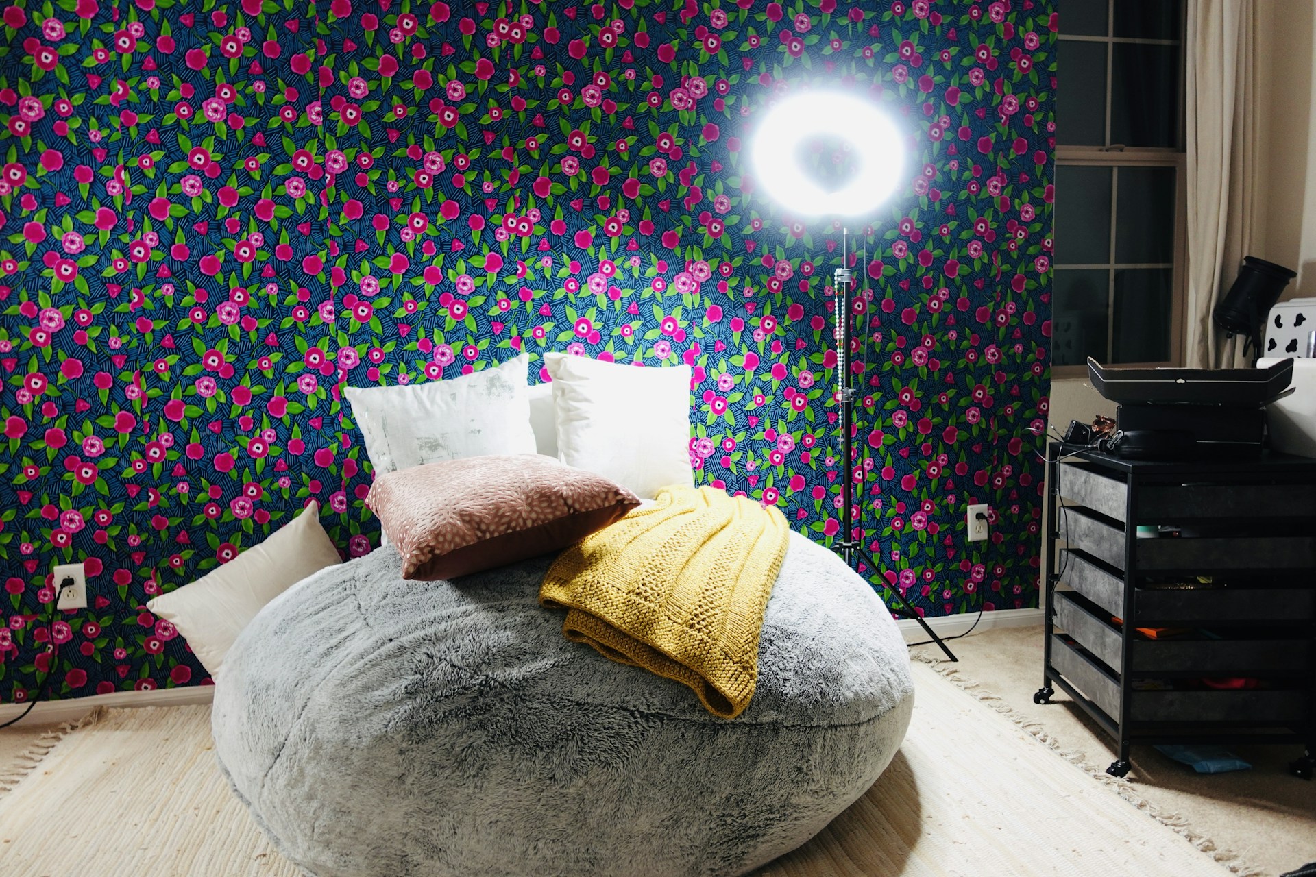 woman wearing yellow long-sleeved dress under white clouds and blue sky during daytime