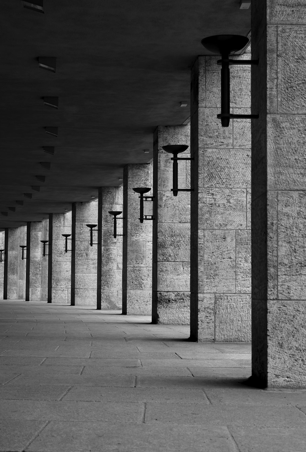 grayscale photo of concrete wall