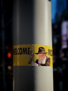 A new immigrant receiving guidance from a friendly volunteer.