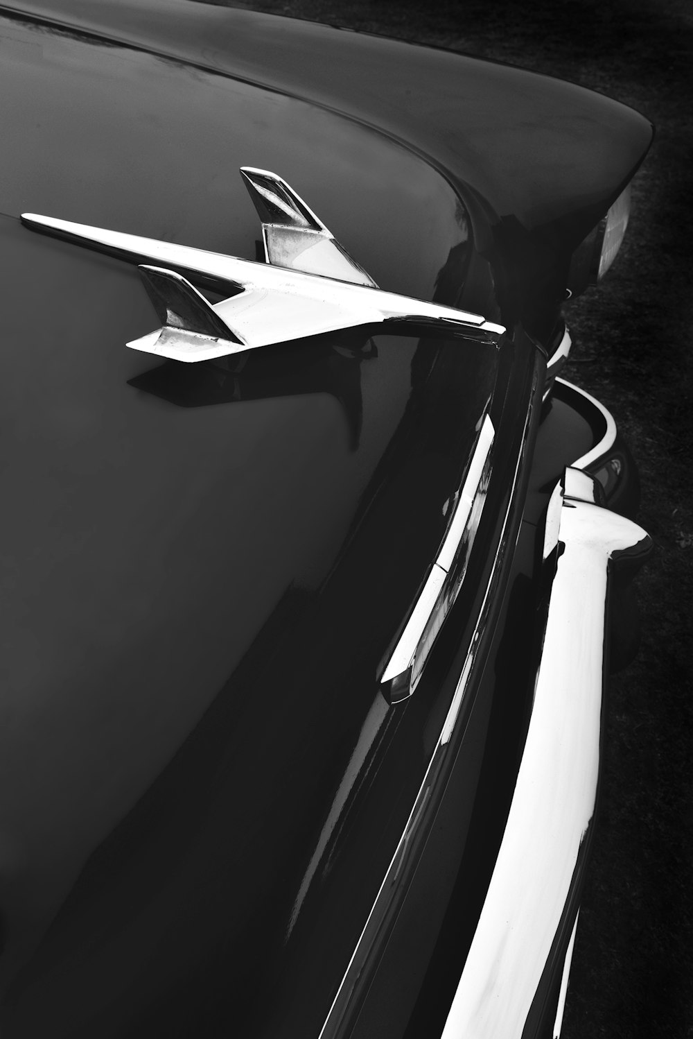 grayscale photo of car hood