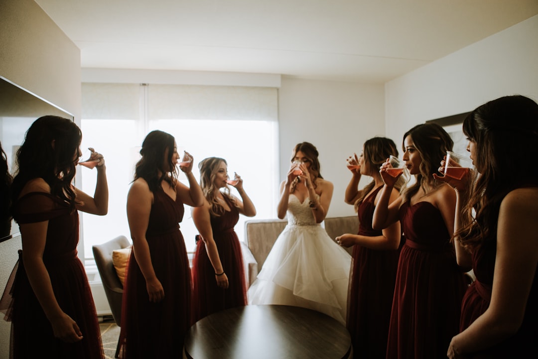 group of women in red dress