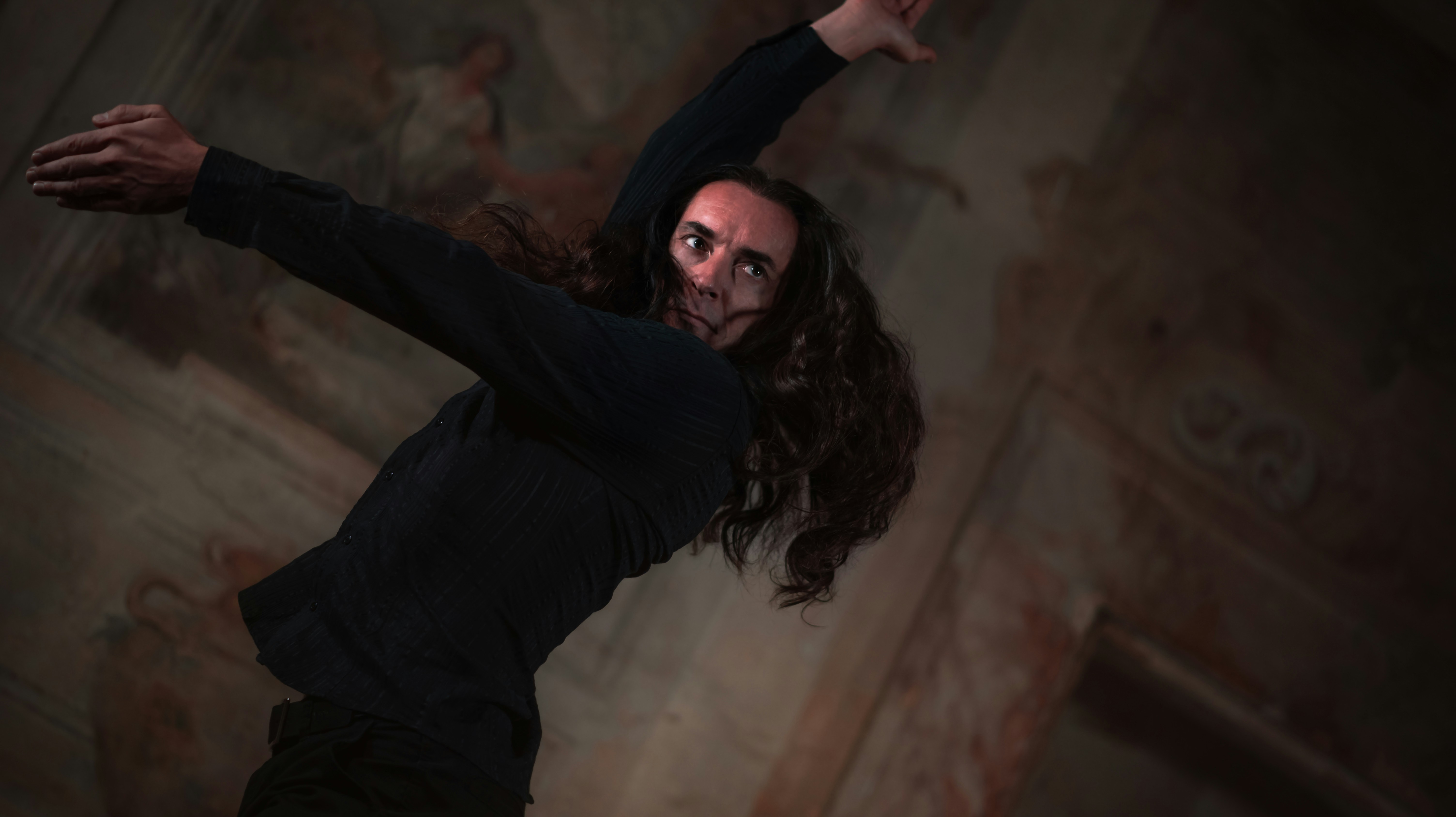 woman wearing yellow long-sleeved dress under white clouds and blue sky during daytime